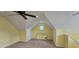 Bright bonus room featuring plush carpet, octagon window, and ample storage space with built-in closet at 1106 Brittley Way, Apex, NC 27502