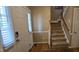 Entryway boasting hardwood floors and a staircase, leading to upper level at 1106 Brittley Way, Apex, NC 27502