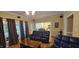 Inviting living room with hardwood floors and a view to a bright, eat-in kitchen at 1106 Brittley Way, Apex, NC 27502