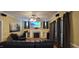 Cozy living room features a fireplace and media center for entertainment at 1106 Brittley Way, Apex, NC 27502