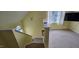 Staircase with carpeted steps going to the attic at 1106 Brittley Way, Apex, NC 27502
