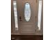 Elegant front door with decorative glass and sidelights for a grand entrance at 1126 Woodlands Creek Way, Apex, NC 27502
