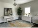 Living room featuring a piano and modern furnishings at 1126 Woodlands Creek Way, Apex, NC 27502