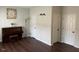 Living room featuring dark wood flooring and white trim at 1126 Woodlands Creek Way, Apex, NC 27502
