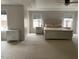Bright main bedroom featuring a tray ceiling, carpet, and coordinated furniture at 1126 Woodlands Creek Way, Apex, NC 27502