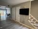 Open-concept living room showcasing hardwood floors and seamless access to the dining area at 1136 Nottingham Cir, Cary, NC 27511