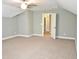 Large bedroom with neutral walls, carpet, and a ceiling fan for added comfort at 120 Glen Oaks Dr, Youngsville, NC 27596