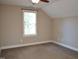 Bright bedroom featuring a window providing natural light and a relaxing atmosphere at 120 Glen Oaks Dr, Youngsville, NC 27596