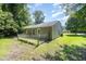Charming backyard featuring a chainlink fence, providing a secure and private outdoor space at 125 Brook Pl, Smithfield, NC 27577