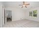 Bedroom with carpet flooring, natural light, and ceiling fan at 125 Brook Pl, Smithfield, NC 27577