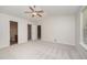 Bedroom featuring an open floor plan, natural light, and easy access to the bathroom at 125 Brook Pl, Smithfield, NC 27577