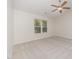 Cozy bedroom includes a ceiling fan, and natural light from a window at 125 Brook Pl, Smithfield, NC 27577