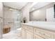 Bathroom featuring neutral colors, tile floors, glass shower, and a stylish vanity at 127 Creekwood, Pittsboro, NC 27312