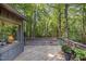 Home's deck with trees in background at 127 Creekwood, Pittsboro, NC 27312