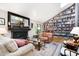 Spacious living room with high ceilings, custom bookshelves, and fireplace at 127 Creekwood, Pittsboro, NC 27312