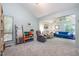 Spacious living room with vaulted ceiling and featuring ample natural light and comfortable seating at 127 Creekwood, Pittsboro, NC 27312