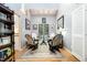 Cozy seating area with high ceilings and natural light at 127 Creekwood, Pittsboro, NC 27312