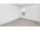Carpeted bedroom with a light fixture and a view from the window at 130 Summer Mist Ln # 160, Clayton, NC 27527