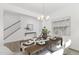 Bright dining room with modern chandelier, seating for six, and white walls at 130 Summer Mist Ln # 160, Clayton, NC 27527