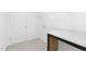 Efficient laundry room with countertop, storage cabinet, and convenient connections for appliances at 130 Summer Mist Ln # 160, Clayton, NC 27527