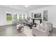 Bright and airy living room with neutral tones, modern decor, and ample natural light at 130 Summer Mist Ln # 160, Clayton, NC 27527