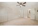 Bedroom featuring wall to wall closets and easy access to other rooms and bathroom at 1317 Elmset Ln, Durham, NC 27713