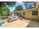 Wooden deck featuring comfortable seating, perfect for outdoor relaxation at 1317 Elmset Ln, Durham, NC 27713