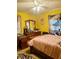 Bright yellow secondary bedroom with fan at 175 Ann Dr, Timberlake, NC 27583