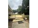 Newly constructed wooden deck with potted plants and outdoor grill at 175 Ann Dr, Timberlake, NC 27583