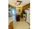 Functional kitchen with ample cabinet space, white appliances, and a central island at 175 Ann Dr, Timberlake, NC 27583