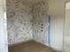 Nicely tiled shower featuring marble pattern on tile in herringbone pattern at 200 Meadow Walk Dr, Fuquay Varina, NC 27526