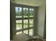Foyer with staircase features large windows that offer natural light and exterior views at 200 Meadow Walk Dr, Fuquay Varina, NC 27526