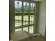 Foyer with staircase features large windows that offer natural light and outdoor views at 200 Meadow Walk Dr, Fuquay Varina, NC 27526
