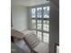 Foyer with staircase features large windows that offer natural light and neighborhood views at 200 Meadow Walk Dr, Fuquay Varina, NC 27526