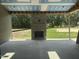 Covered patio with stone fireplace at 200 Meadow Walk Dr, Fuquay Varina, NC 27526