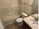 This cozy bathroom features a tub and shower combo and a vanity with a sink at 2012 Ranch Mill Cir, Raleigh, NC 27610