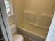 A bathroom showing the toilet and shower at 2012 Ranch Mill Cir, Raleigh, NC 27610