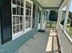 Comfortable porch with classic railing and a glimpse of the tranquil neighborhood at 2012 Ranch Mill Cir, Raleigh, NC 27610