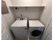 This compact laundry room contains a side-by-side washer and dryer at 2012 Ranch Mill Cir, Raleigh, NC 27610