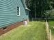 Exterior showcasing the home's architecture, practical design, and landscaped backyard at 2012 Ranch Mill Cir, Raleigh, NC 27610