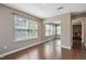 Bedroom featuring hardwood flooring, window and closet doors with mirrored panels at 211 Cloverdale Dr, Durham, NC 27703