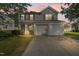 Inviting two-story home showcasing great curb appeal and a convenient two-car garage at 211 Cloverdale Dr, Durham, NC 27703