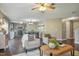Spacious living area with a view of an open kitchen and an elegant dining space at 211 Cloverdale Dr, Durham, NC 27703