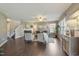 An open living space offers stylish furnishings, a fireplace, and ample natural light at 211 Cloverdale Dr, Durham, NC 27703