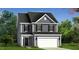 Charming two-story home featuring a classic design, attached garage, and well-manicured lawn at 219 Faith Avenue, Sanford, NC 27330