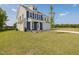 Beautiful new construction featuring a large front yard and charming curb appeal at 227 Faith Avenue, Sanford, NC 27330