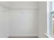 Spacious walk-in closet with built-in shelving, offering plenty of storage in a well lit space at 227 Faith Avenue, Sanford, NC 27330