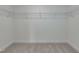 Walk-in closet has metal shelving for ample storage and organization, maximizing space at 227 Faith Avenue, Sanford, NC 27330