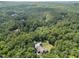 Expansive wooded acreage surrounds this gorgeous home in a quiet and secluded area at 267 Bald Eagle Dr, Pittsboro, NC 27312