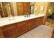 Bathroom features double sinks with wood cabinets and a large mirror at 267 Bald Eagle Dr, Pittsboro, NC 27312